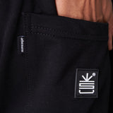 Sweet pant French terry Negro logo en Goma